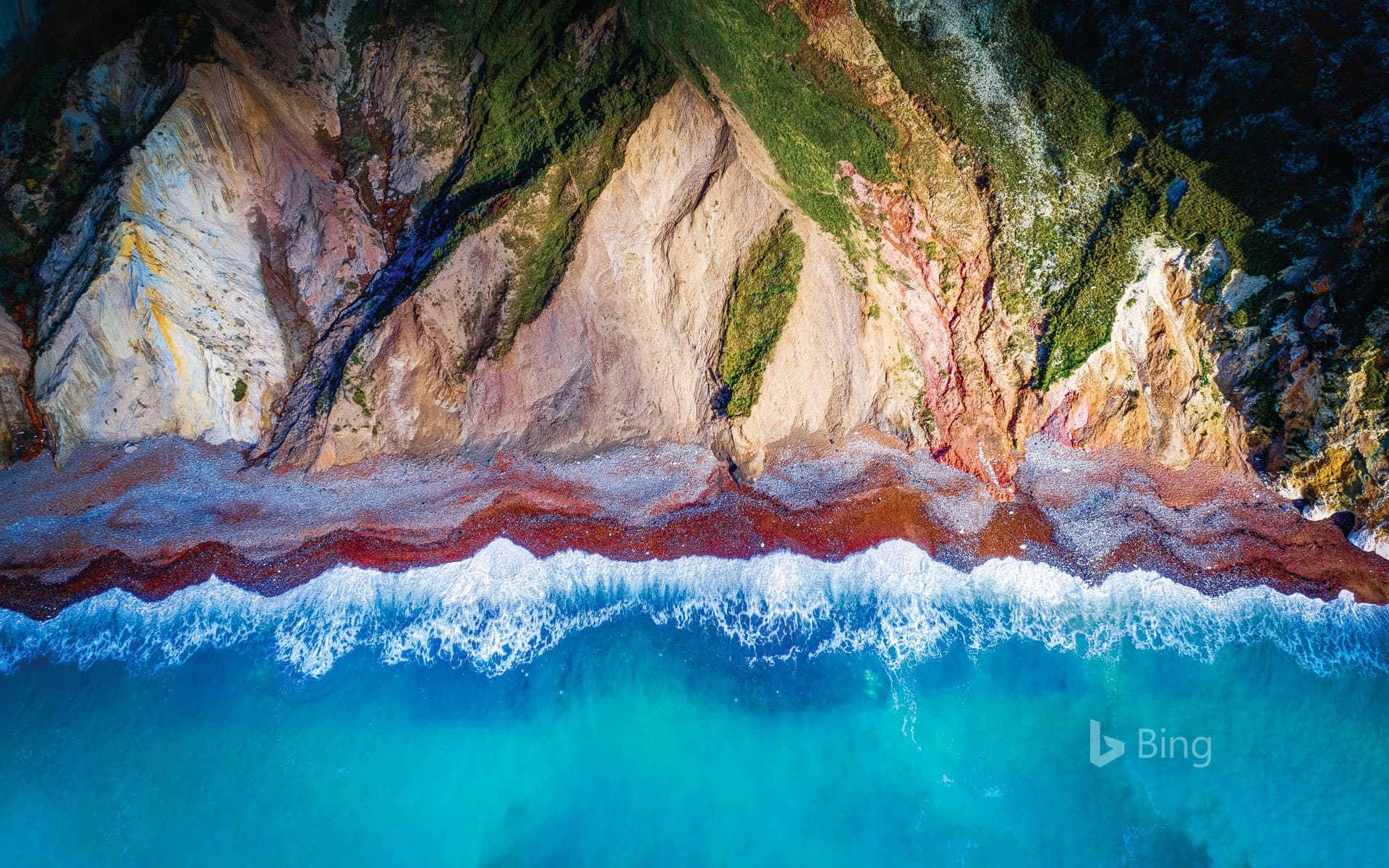 Bing Wallpaper: An aerial view of Alum Bay on the Isle of Wight, England