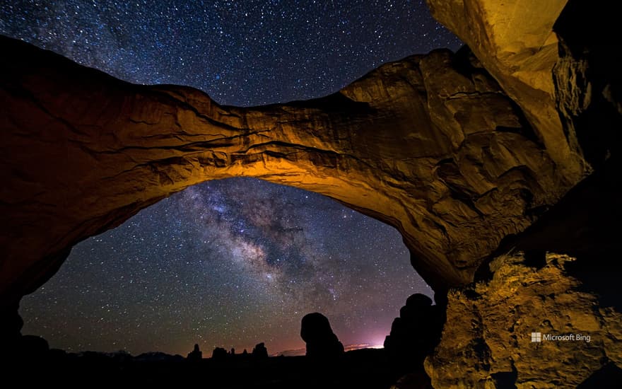 The Milky Way framed by Double Arch in Arches National Park, Utah, United States