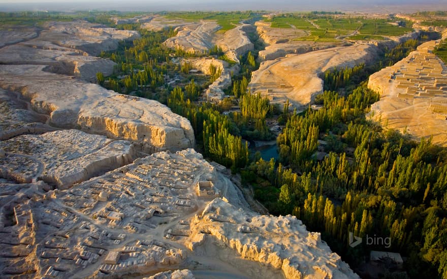 A cemetery overlooking the river gorge in the Turpan Depression, Xinjiang, China