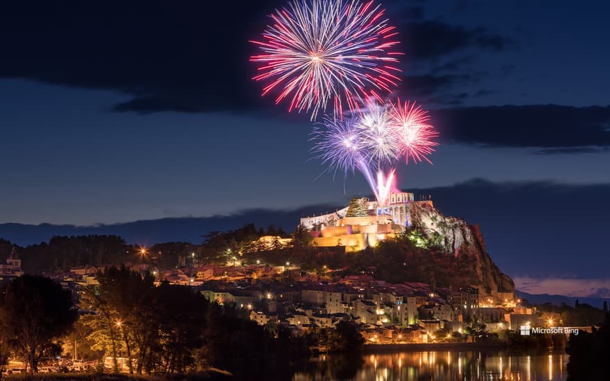 July 14th fireworks over the Sisteron citadel at dusk, Provence