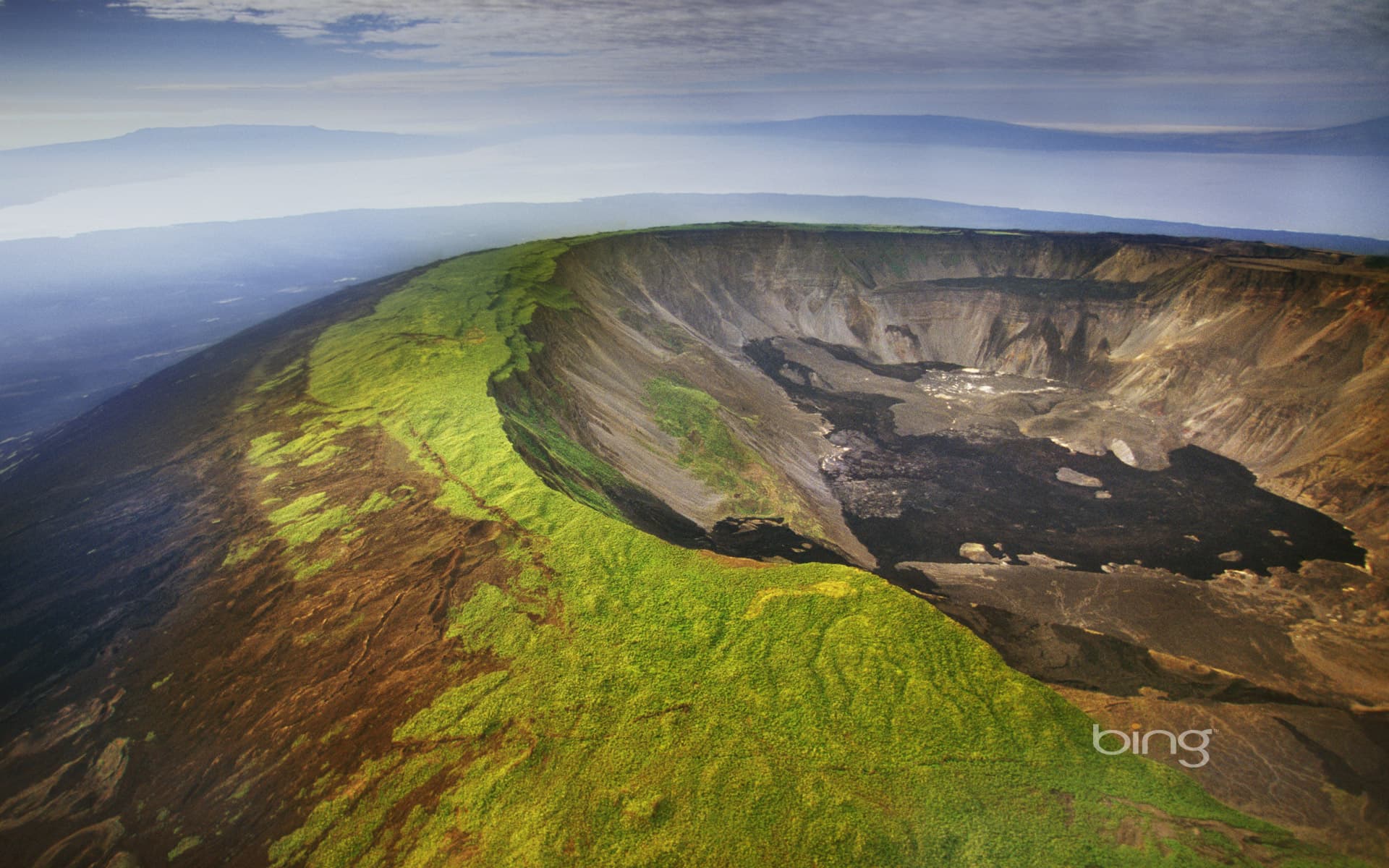 Bing Wallpaper: Aerial view of a volcano caldera, Isabela Island, Galápagos Islands, Ecuador