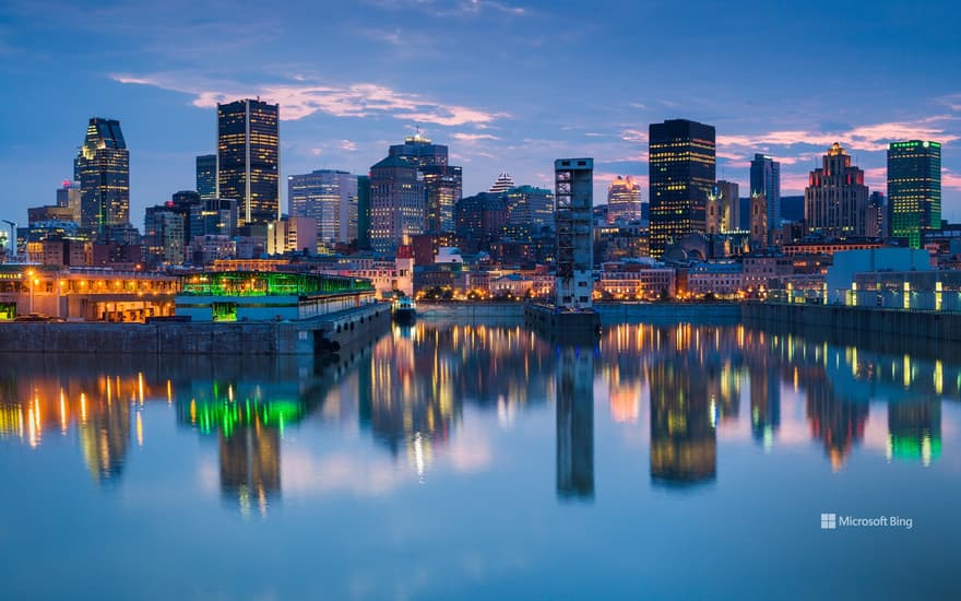 Montreal skyline reflecting in St. Lawrence River, Quebec