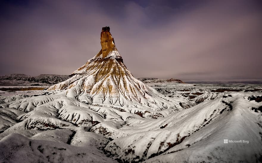 Pico Castildetierra covered in snow in the Bardenas Reales Natural Park, Valtierra, Navarra, Spain