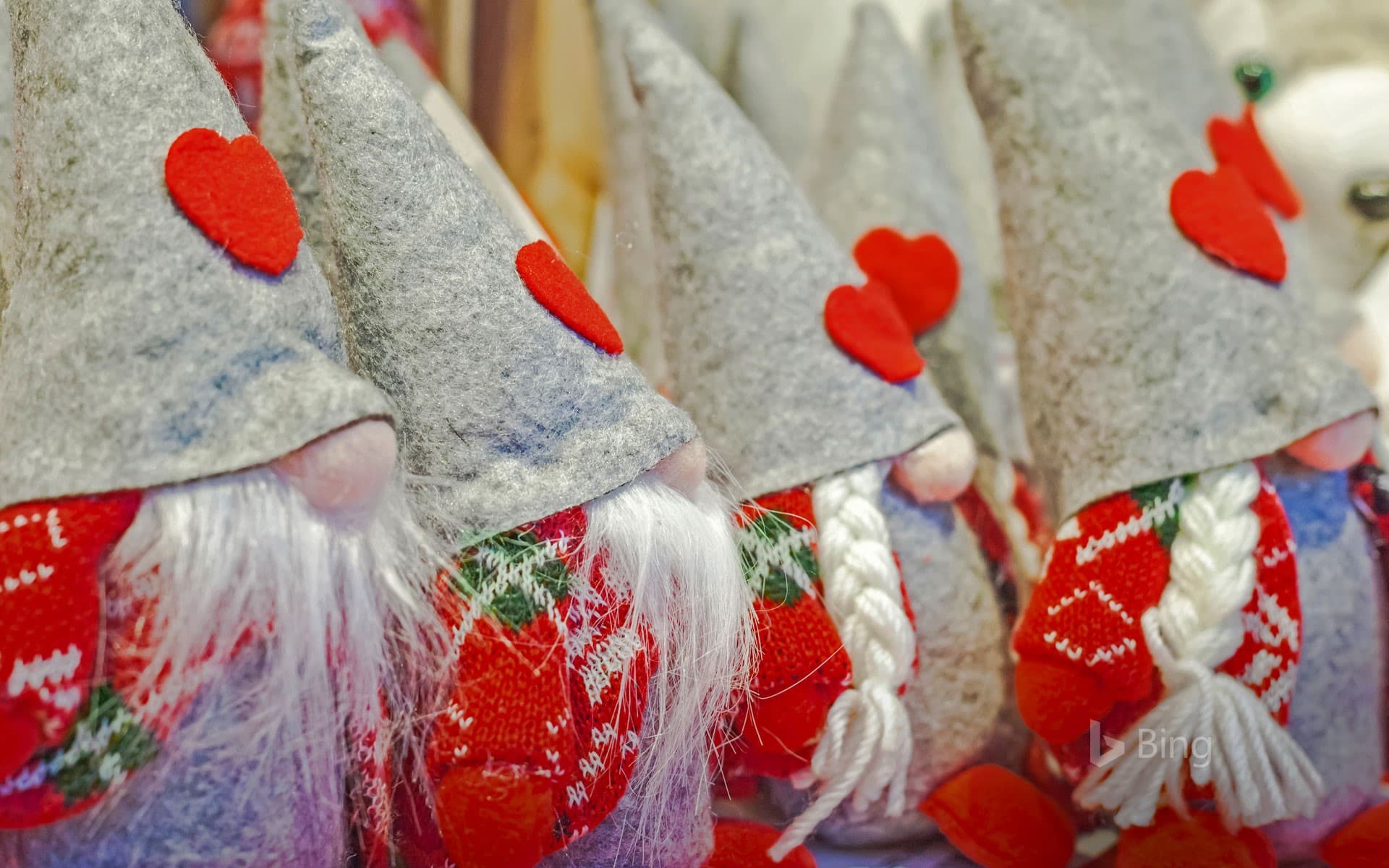 Bing Wallpaper: Gnomes for sale at a Christmas market in Pergine Valsugana, Italy