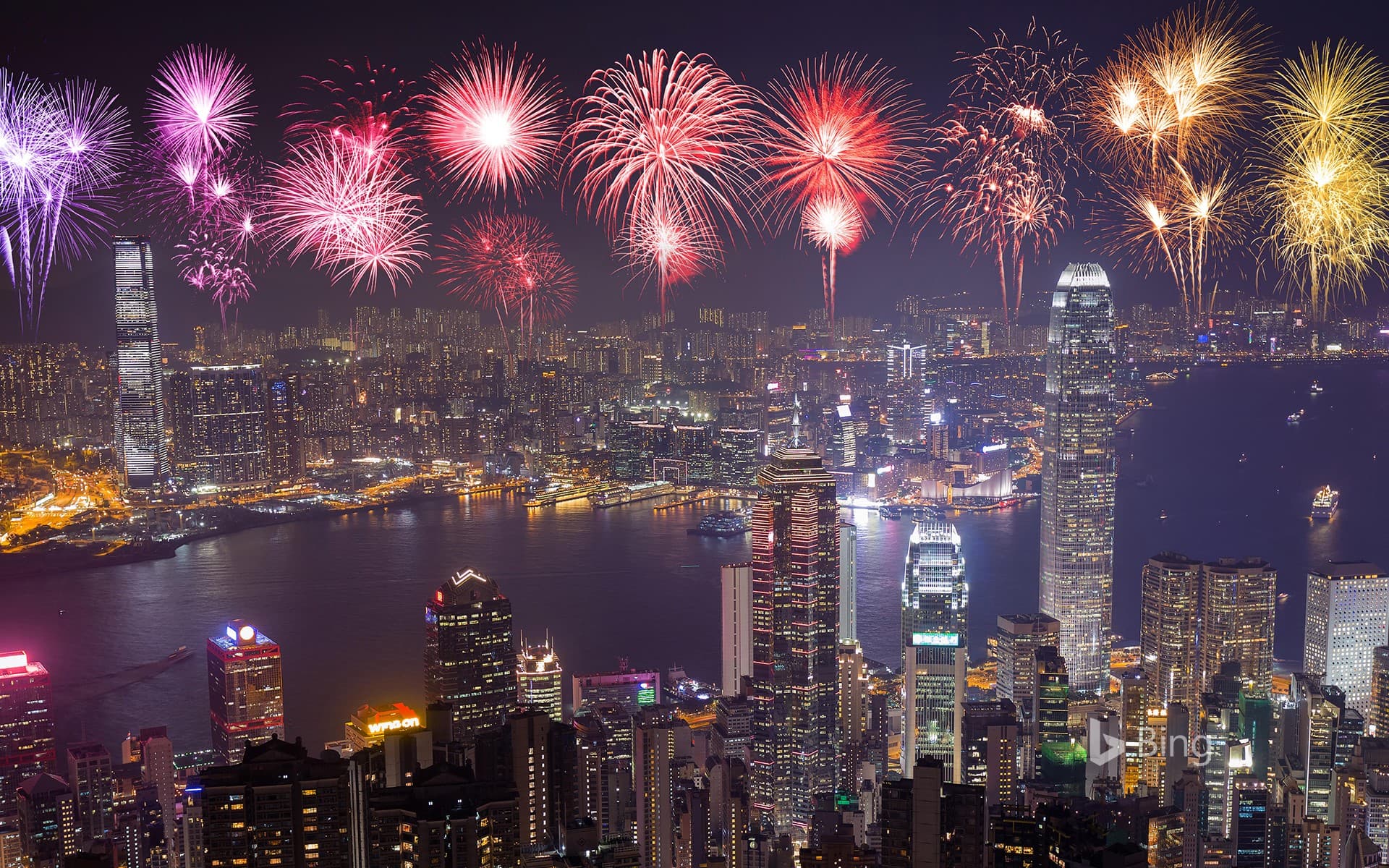 Bing Wallpaper: [New Year's Eve Today] Bright fireworks greet the New Year, Hong Kong, China