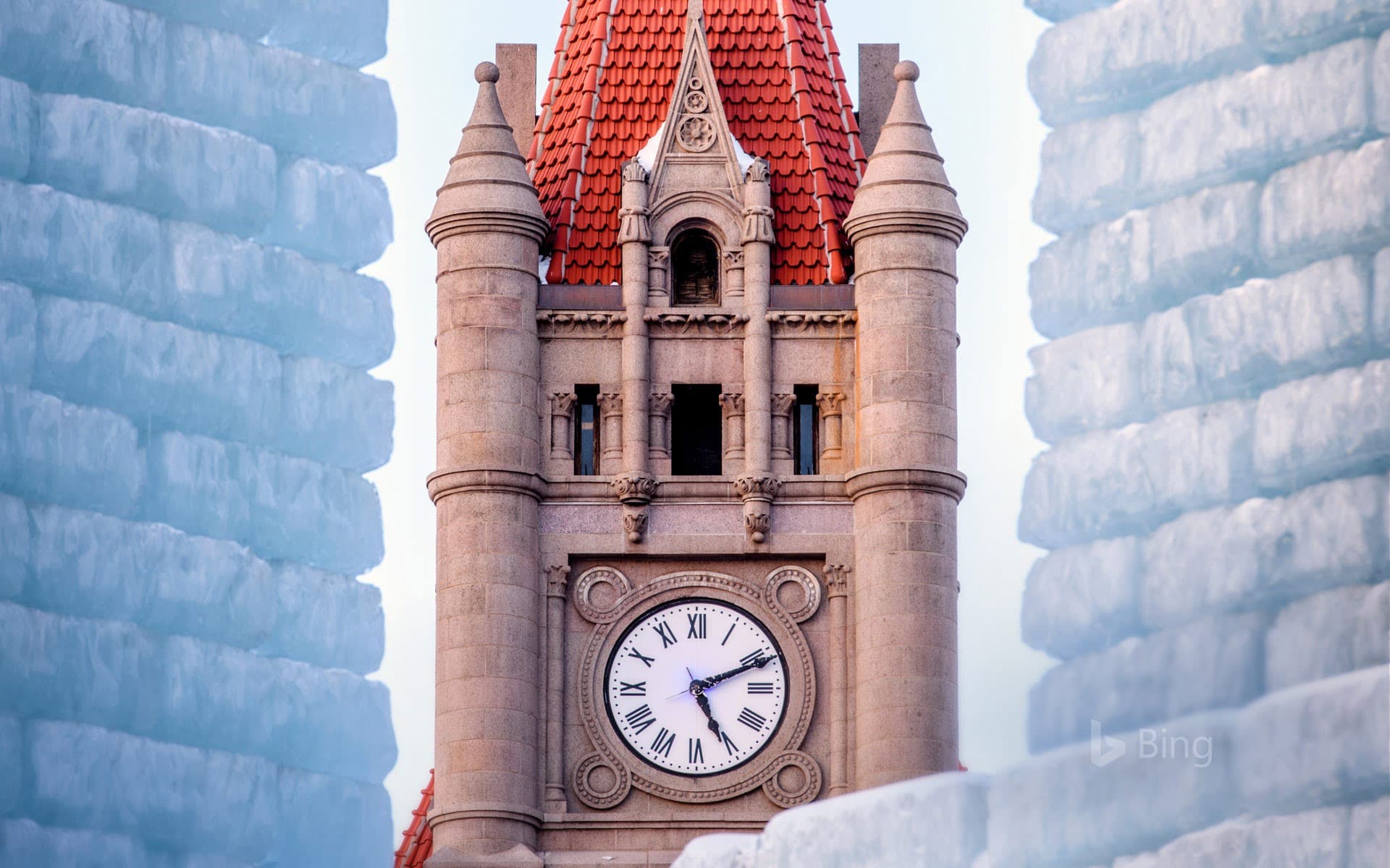 Bing Wallpaper: Landmark Center clock tower and Winter Carnival Ice Palace in St. Paul, Minnesota
