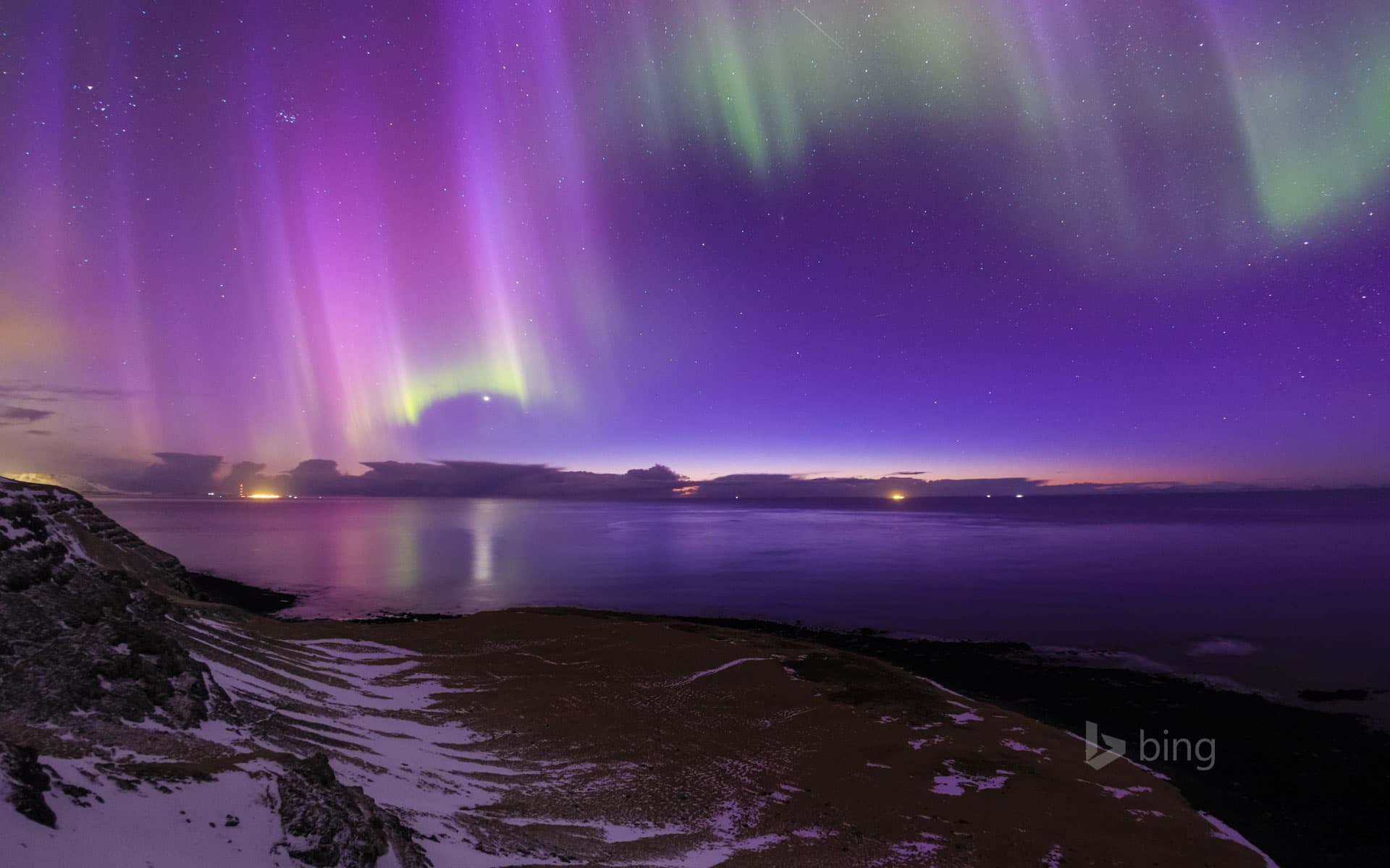 Bing Wallpaper: Aurora Borealis over the coast of Iceland