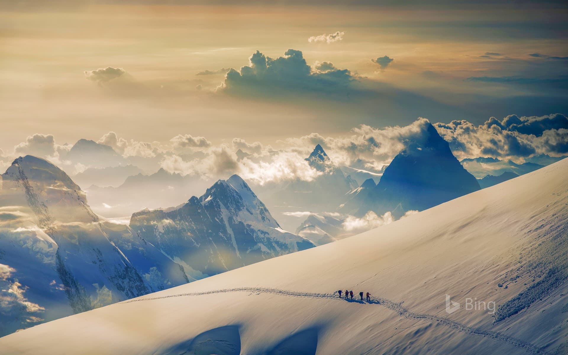Bing Wallpaper: Climbers ascending Jungfrau in the Bernese Alps, Switzerland