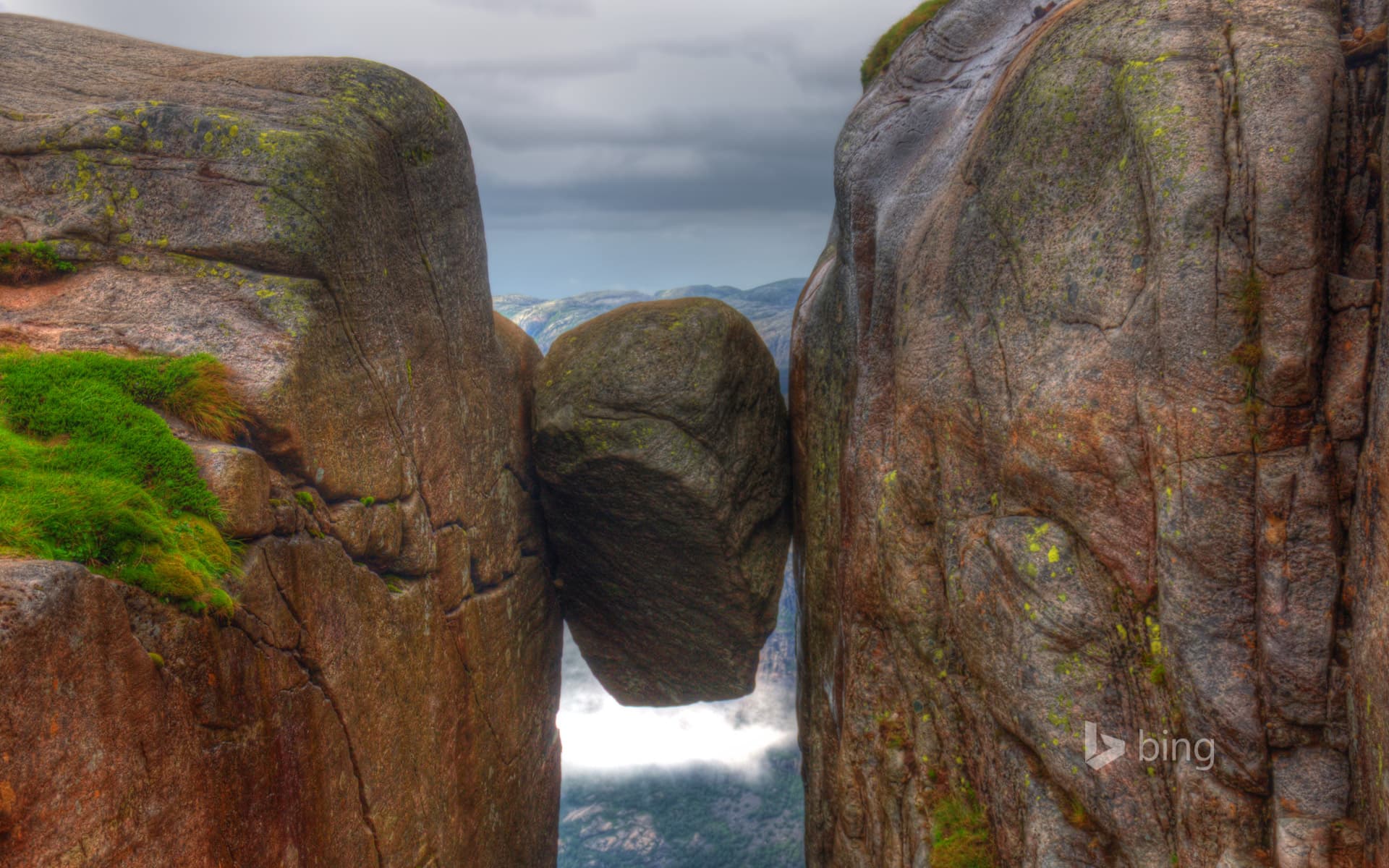Bing Wallpaper: The Kjeragbolten boulder on Kjerag, a mountain, Rogaland, Norway