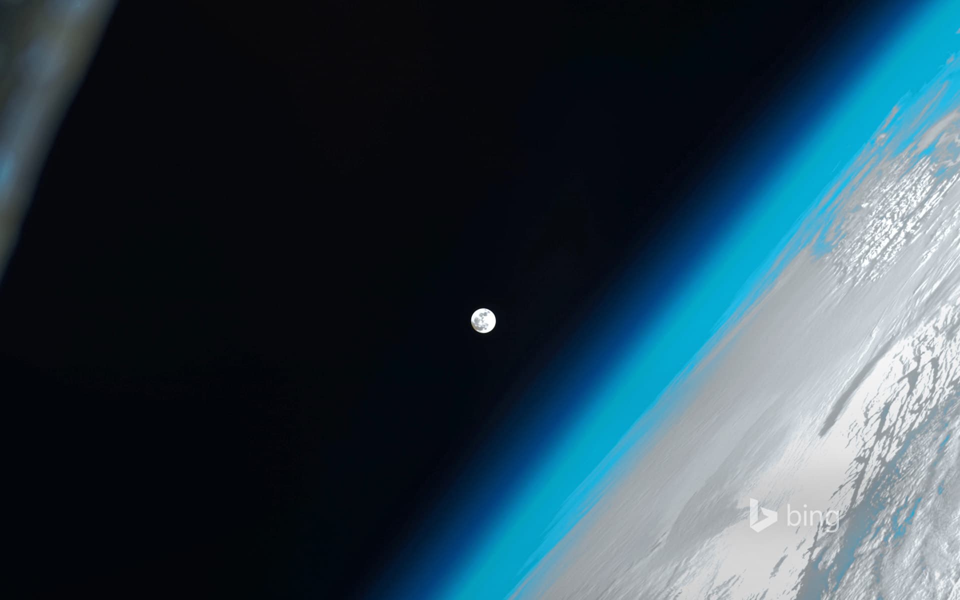 Bing Wallpaper: The moon as seen from the International Space Station