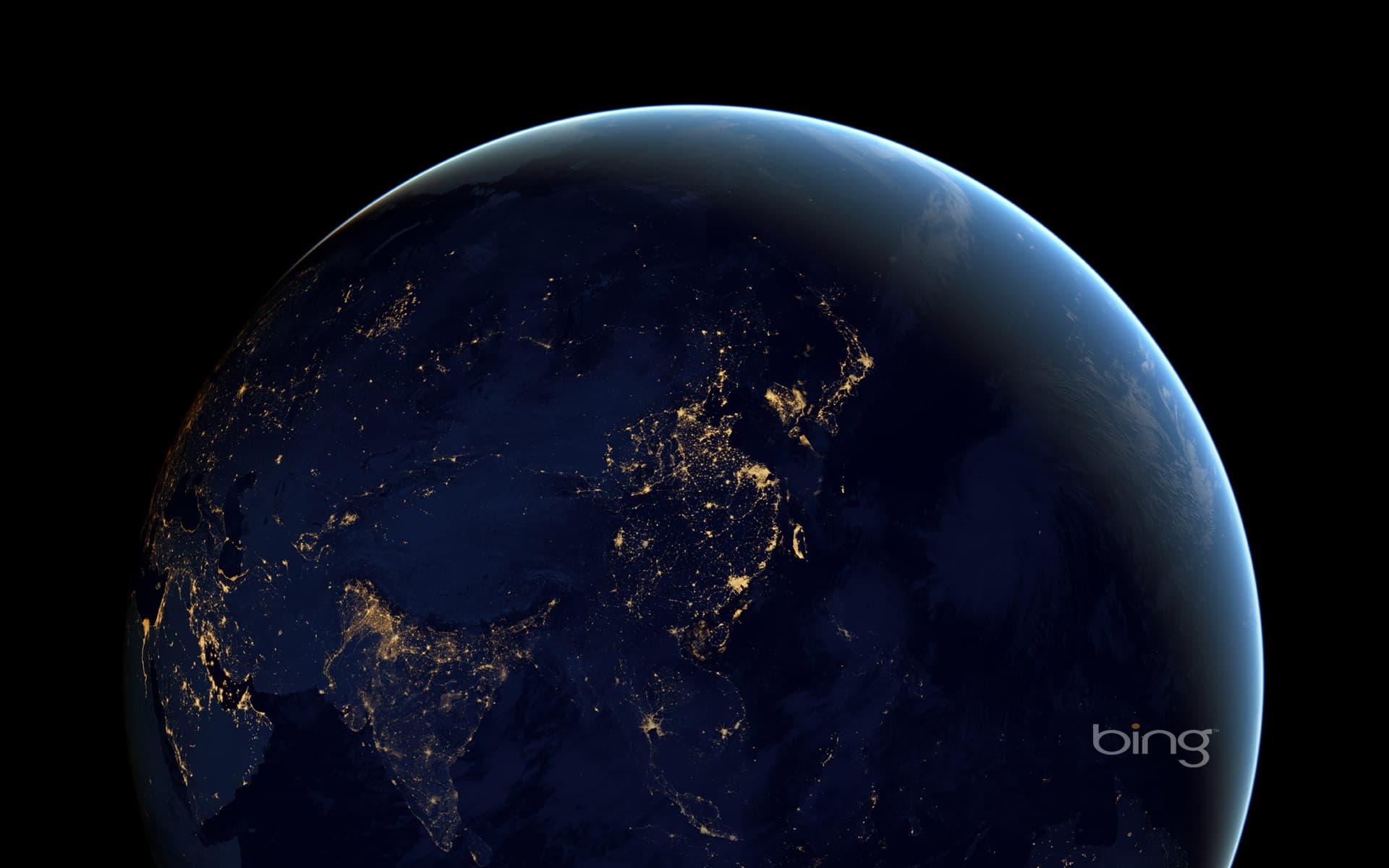 Bing Wallpaper: Composite image of Earth at night from space
