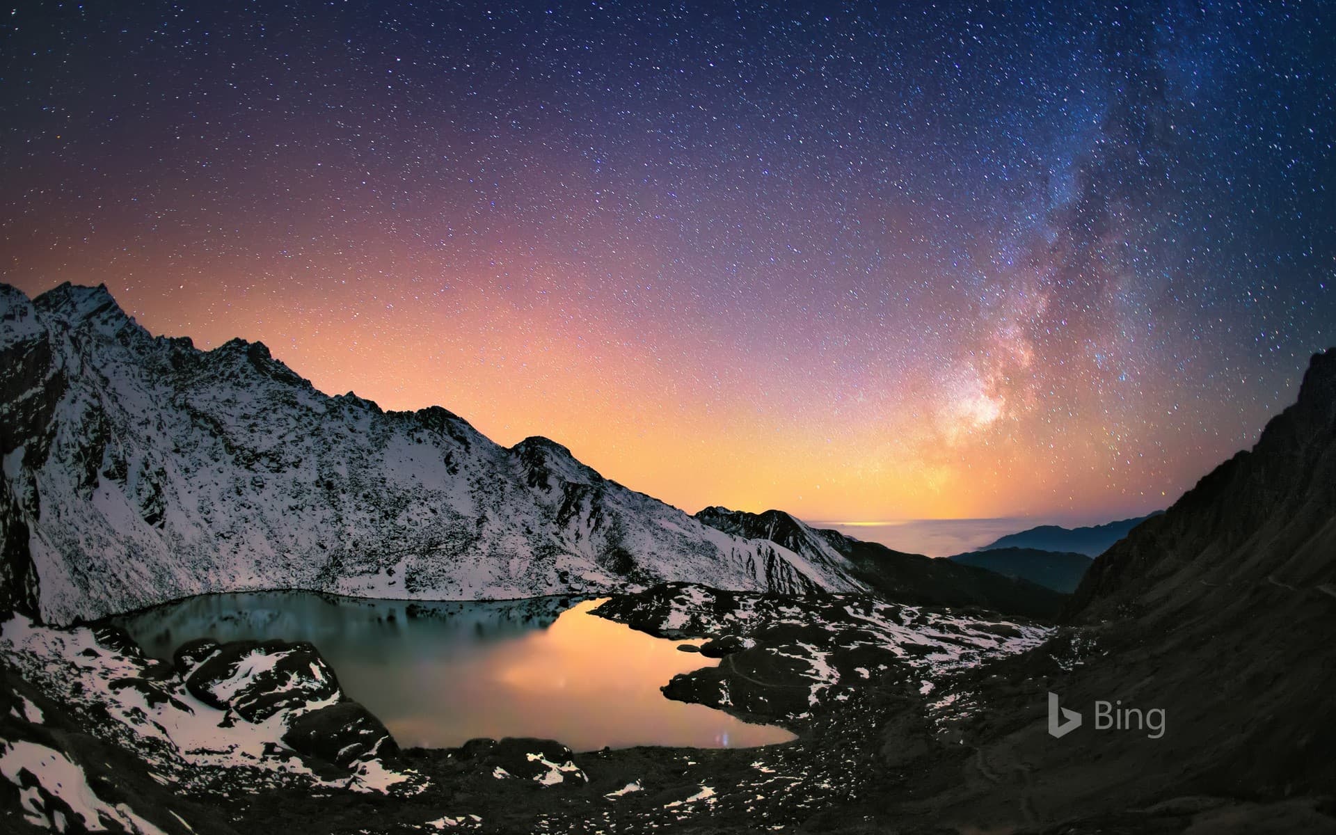 Bing Wallpaper: Nepal's Gosaikunda Lake in the Himalayas and the Milky Way above