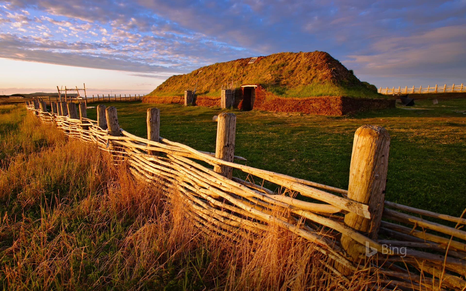 Bing Wallpaper: For Leif Erikson Day, a Norse building at L'Anse aux Meadows National Historic Site in Newfoundland, Canada