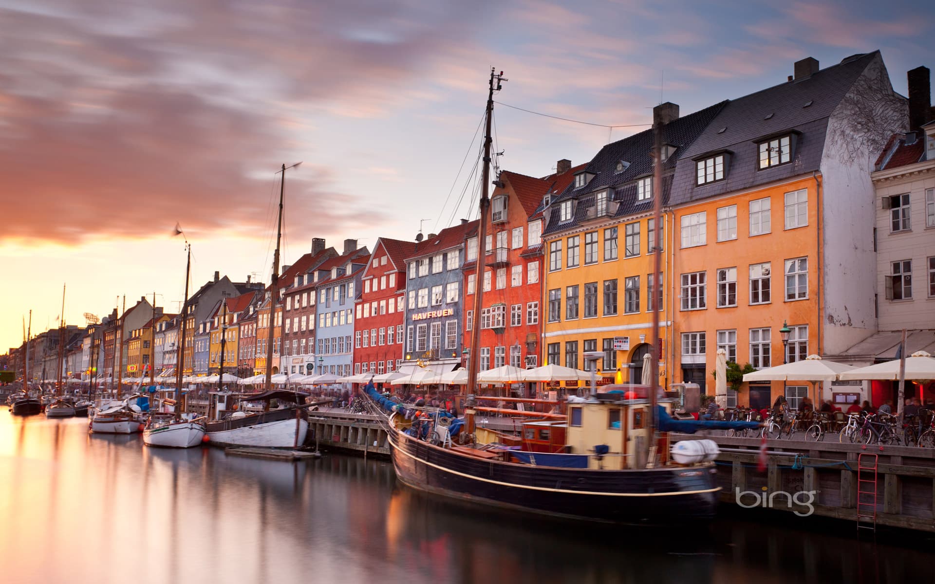 Bing Wallpaper: Colorful houses line Nyhavn canal in Copenhagen, Denmark