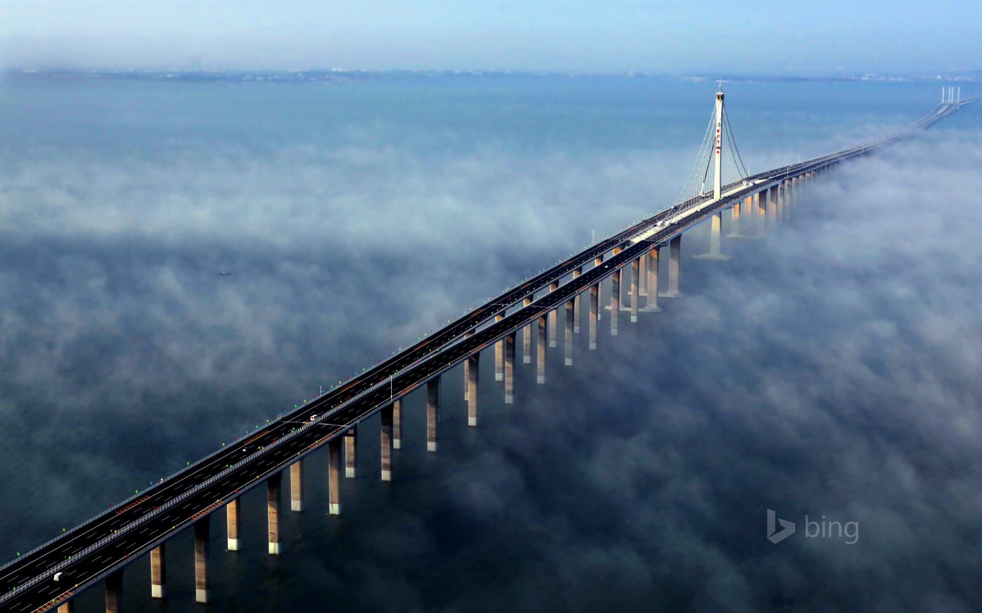 Bing Wallpaper: Aerial view of Jiaozhou Bay Bridge in Qingdao, east China's Shandong Province