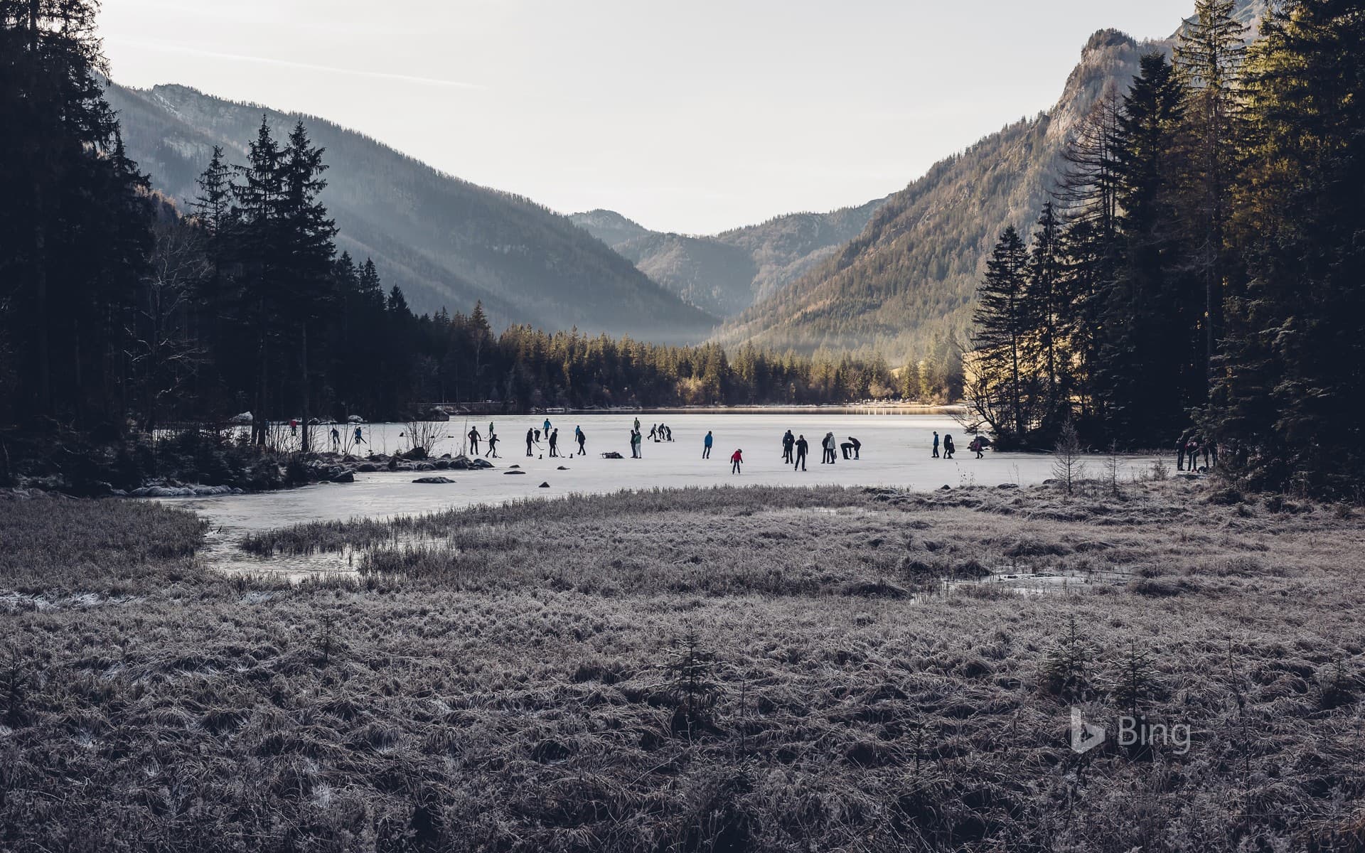 Bing Wallpaper: Ice skaters on Hintersee, a lake in Ramsau, Berchtesgadener Land, Bavaria, Germany