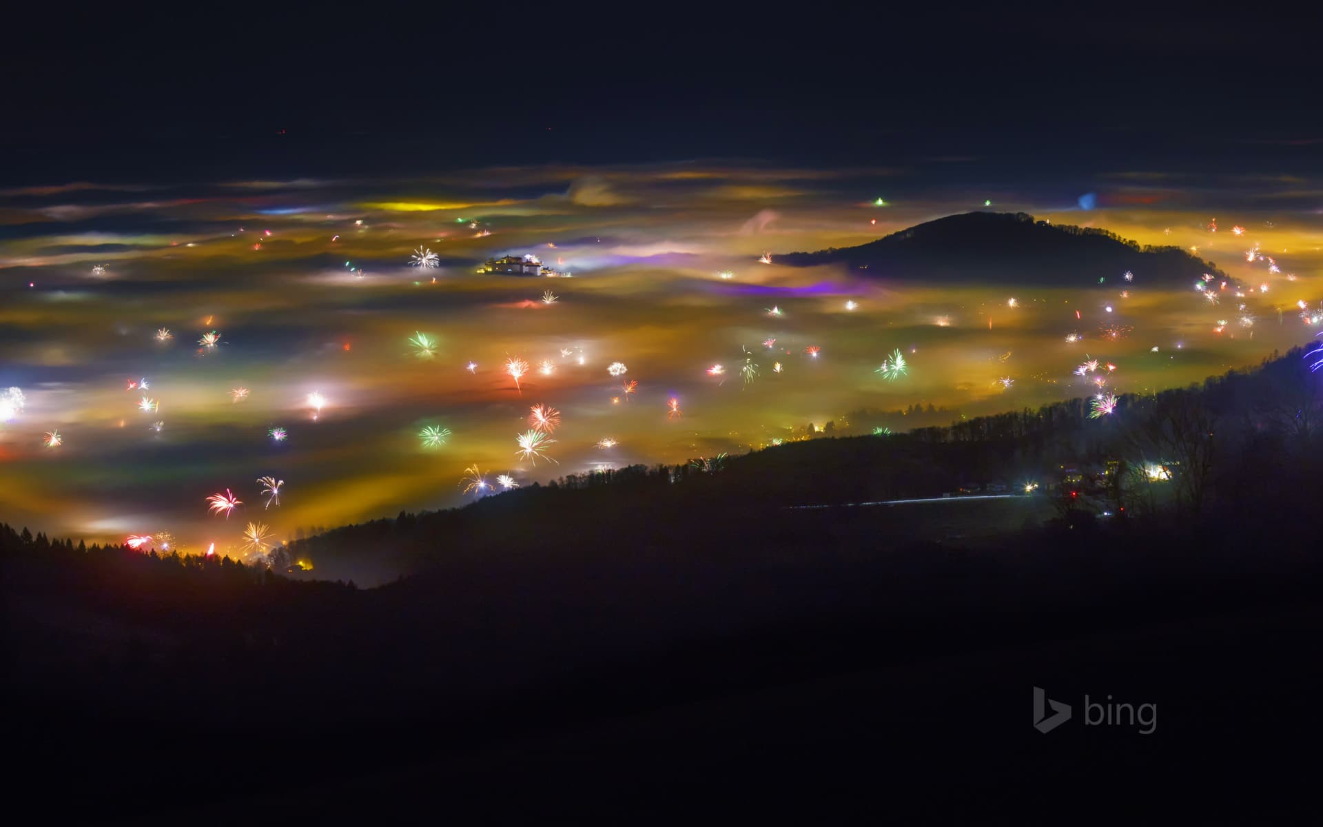 Bing Wallpaper: Fireworks and fog in Salzburg, Austria