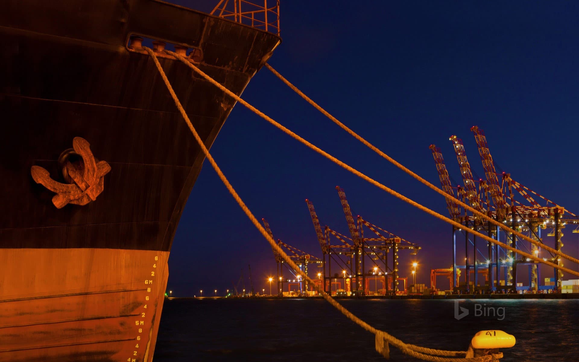 Bing Wallpaper: A ship docked at night in the Port of Cape Town, South Africa