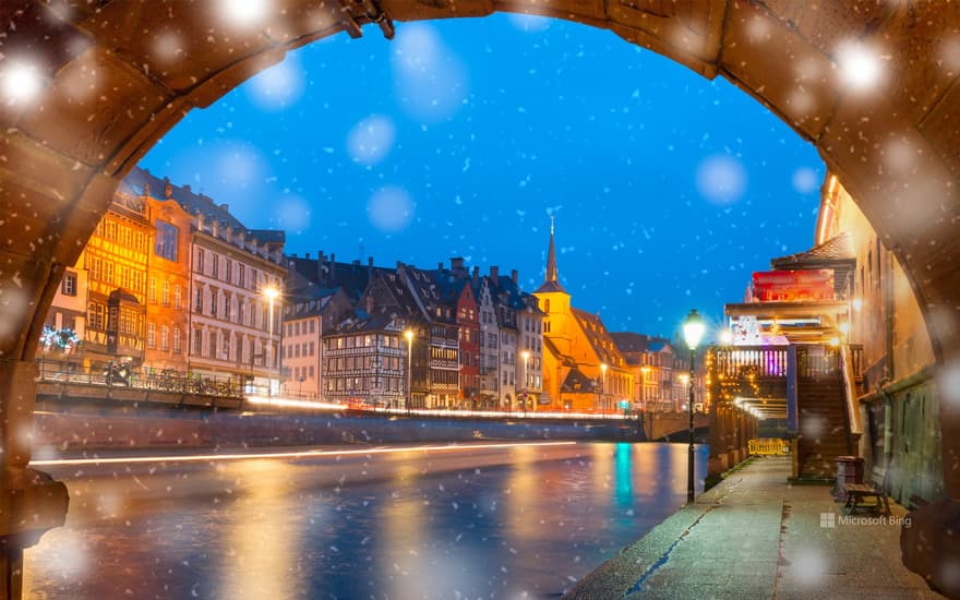 Quai and Saint-Nicolas church in Strasbourg during the holiday season