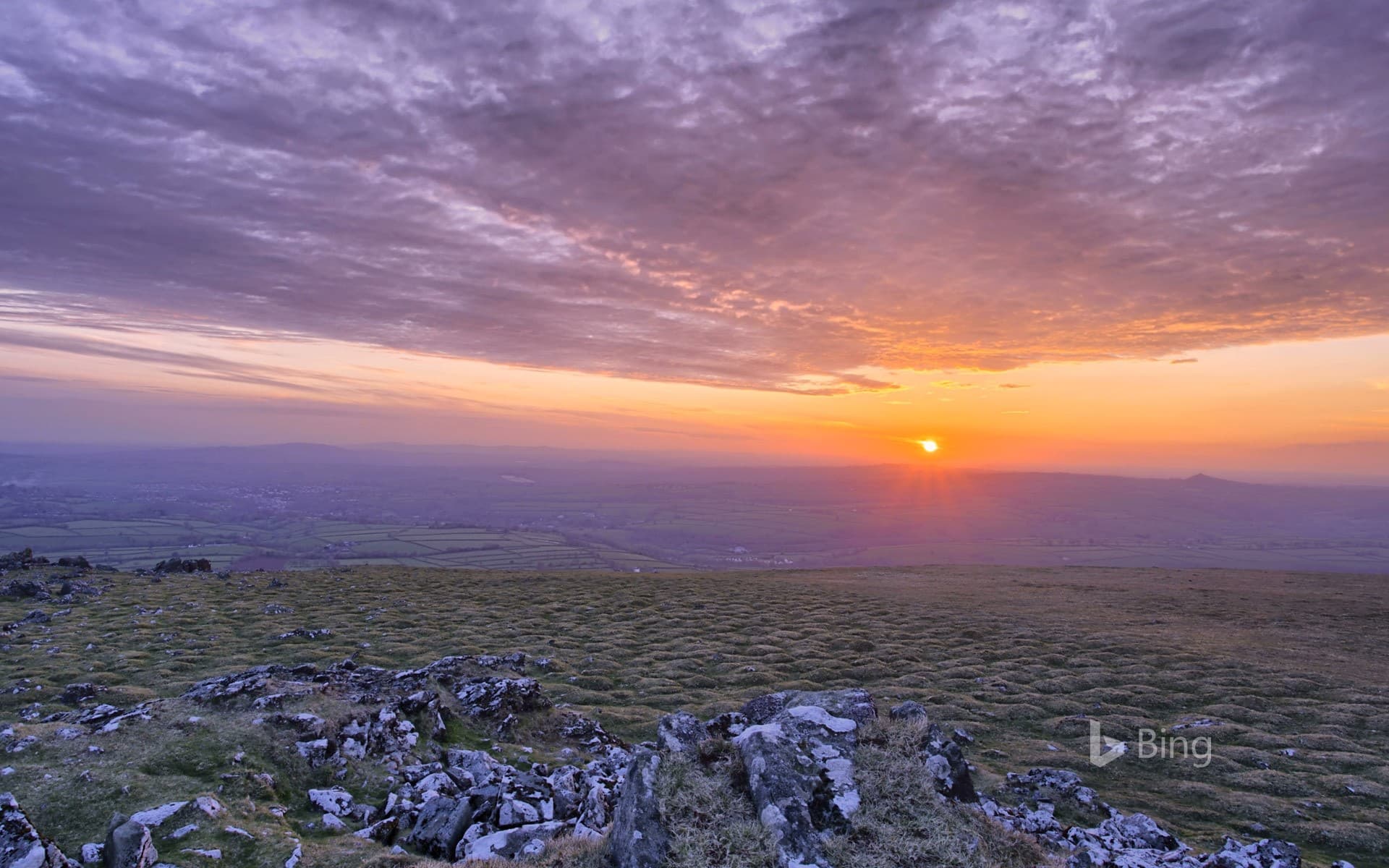 Bing Wallpaper: Sun setting in Dartmoor National Park, Devon