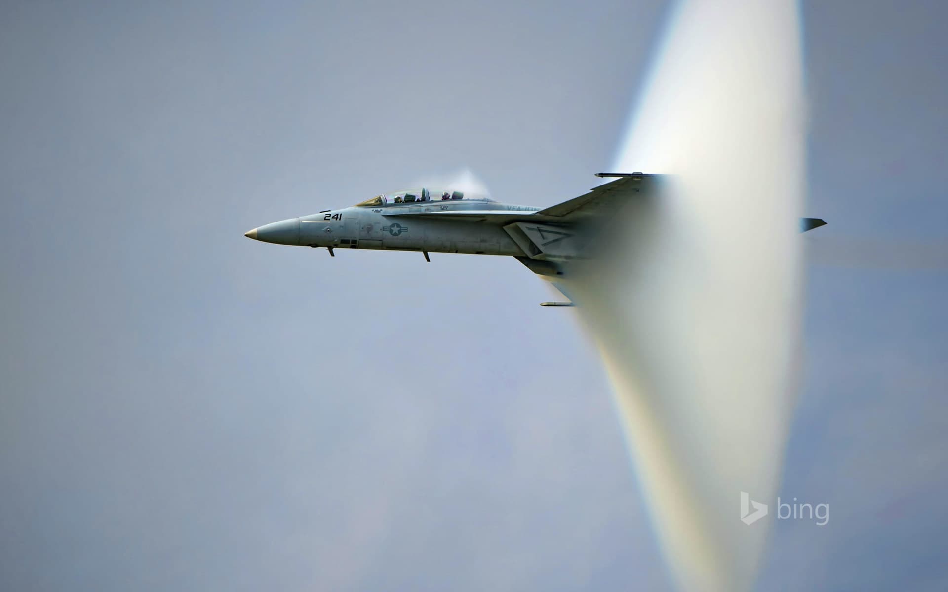 Bing Wallpaper: US Navy F/A-18F Super Hornet creating a sonic boom