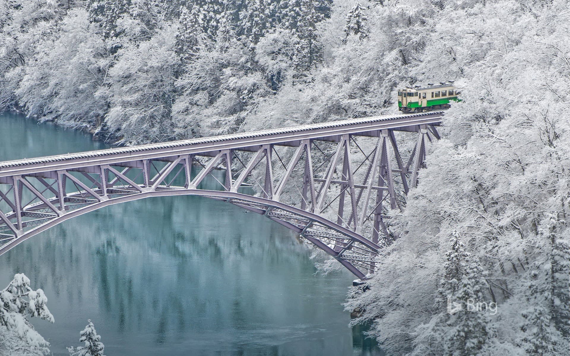 Bing Wallpaper: Train crossing the Tadami River near Mishima village in Japan