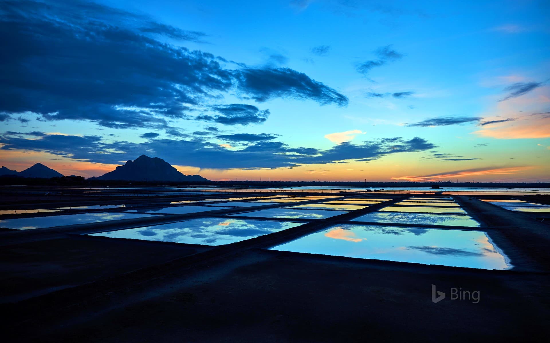 Bing Wallpaper: Sunset over salt pans in Tamil Nadu, India