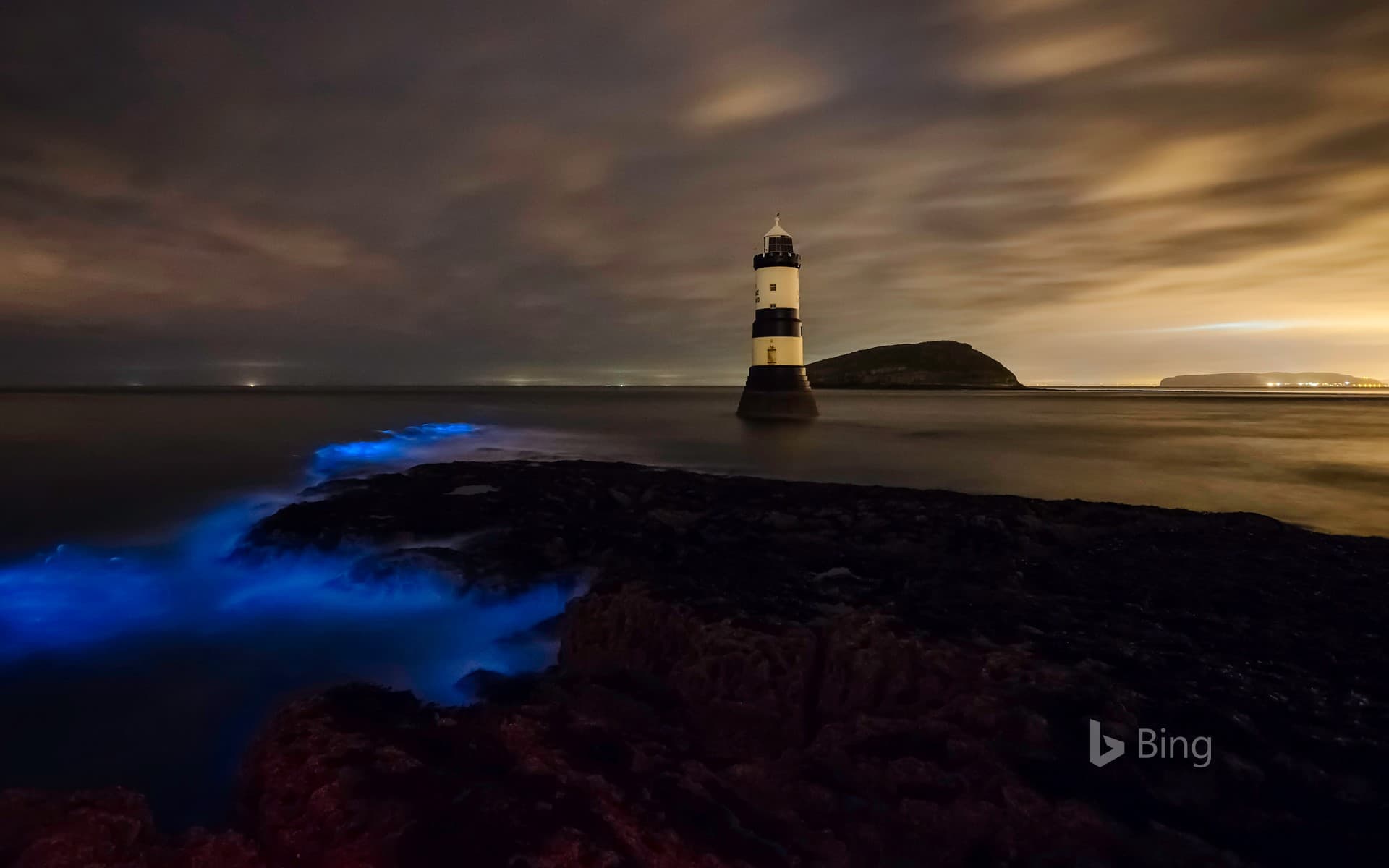Bing Wallpaper: Trwyn Du Lighthouse in Anglesey off the northwest coast of Wales