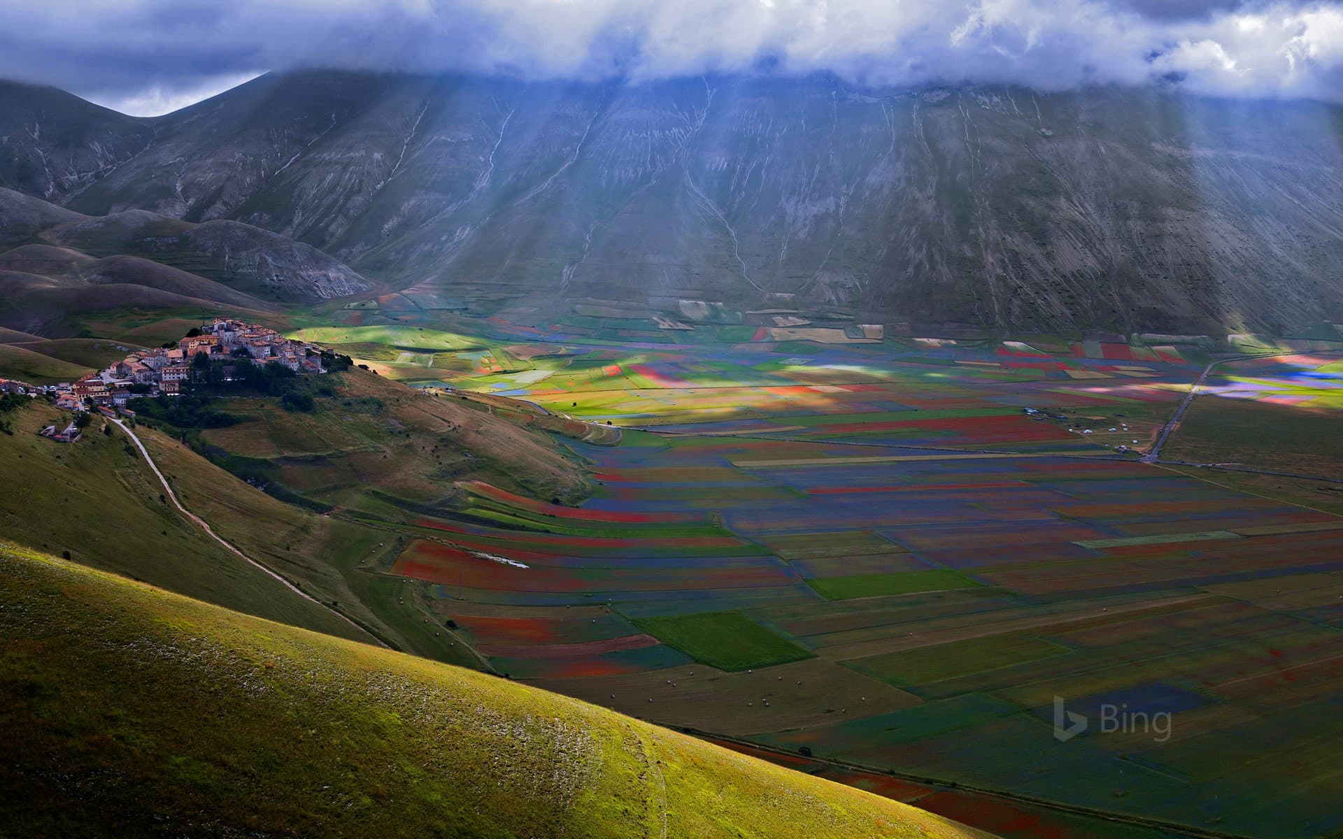 Bing Wallpaper: The village of Castelluccio above the Piano Grande, Umbria, Italy