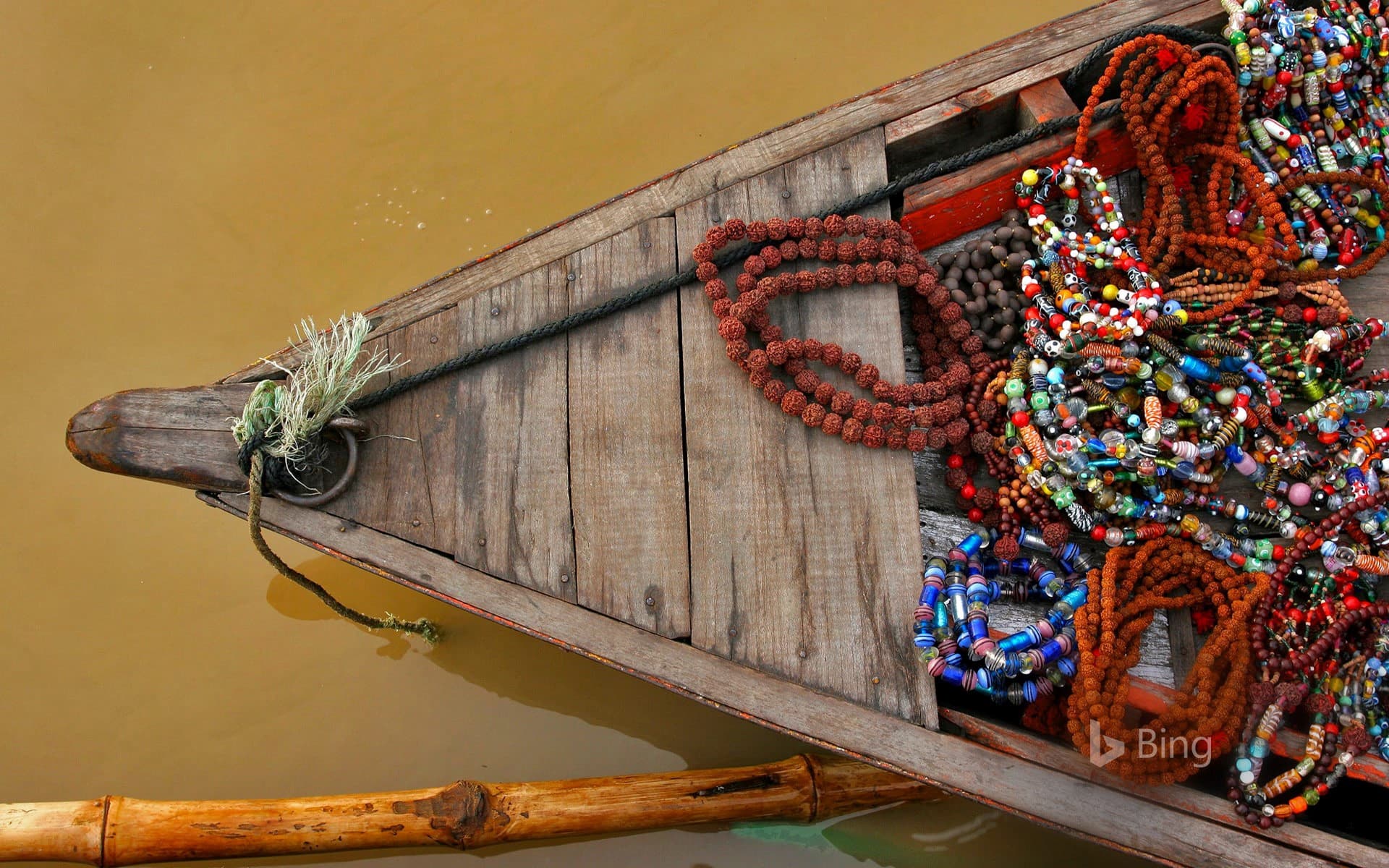 Bing Wallpaper: A boat in the Ganges river at Varanasi, India