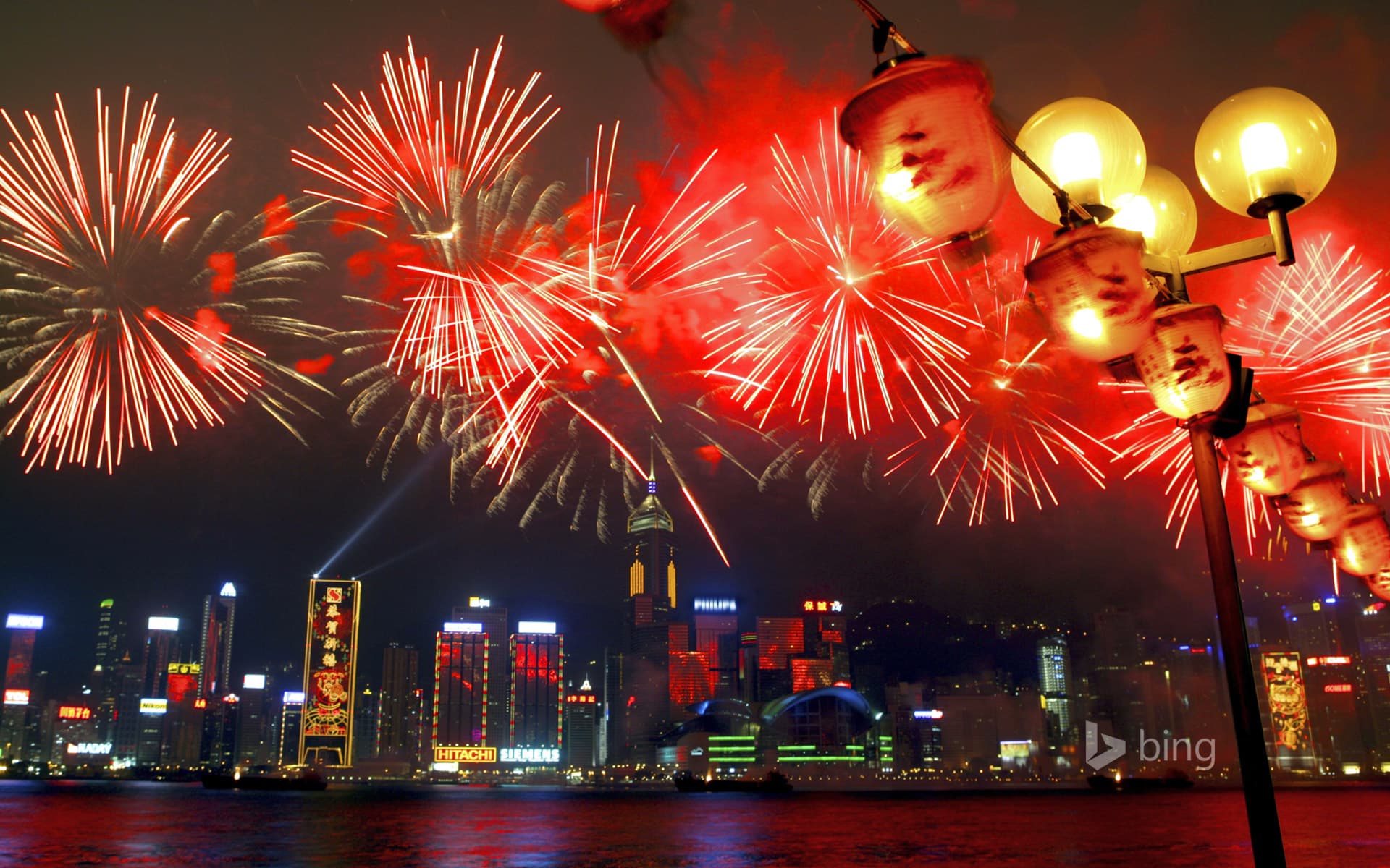 Bing Wallpaper: Fireworks in Victoria Harbour during Chinese New Year festivities, Hong Kong, China