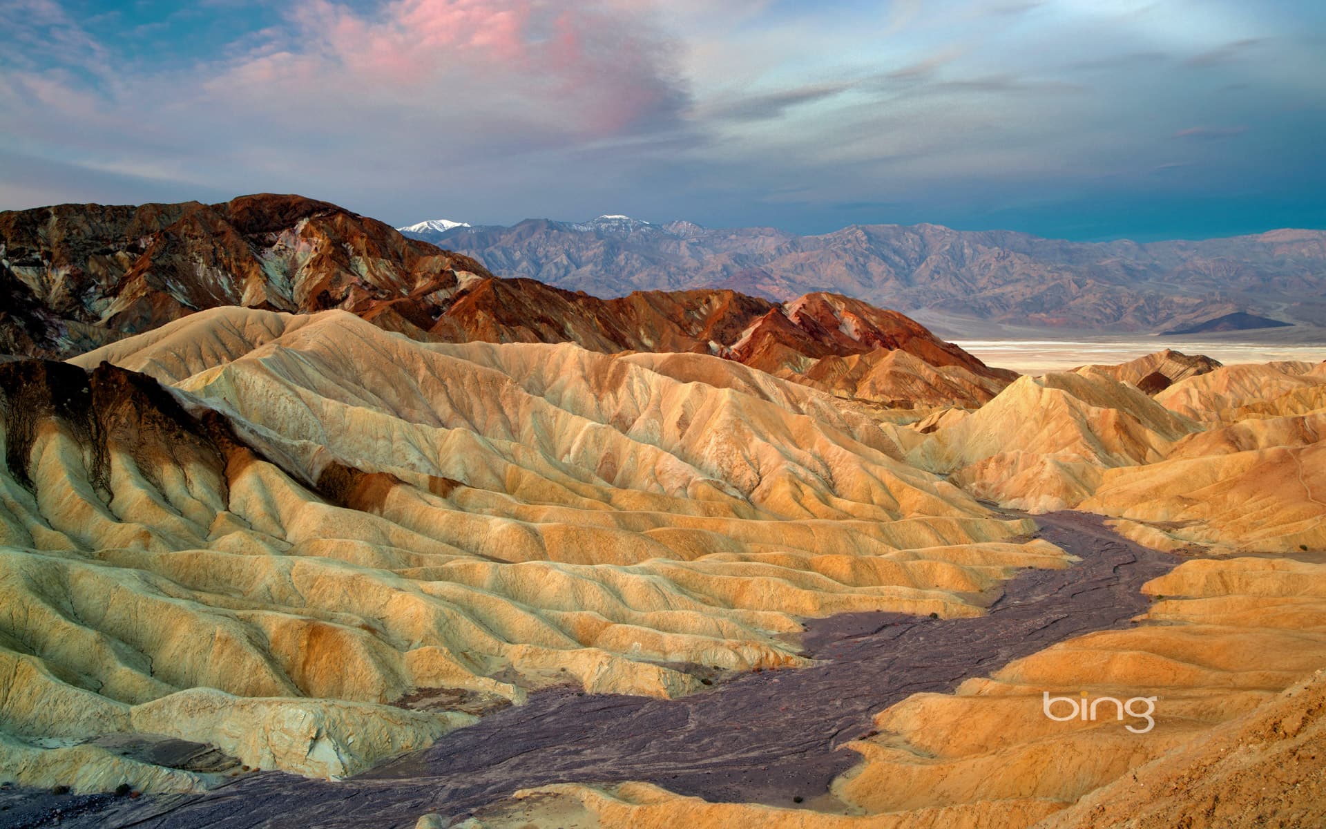 Bing Wallpaper: View of eroded cliffs from Zabriskie Point, Death Valley National Park, California